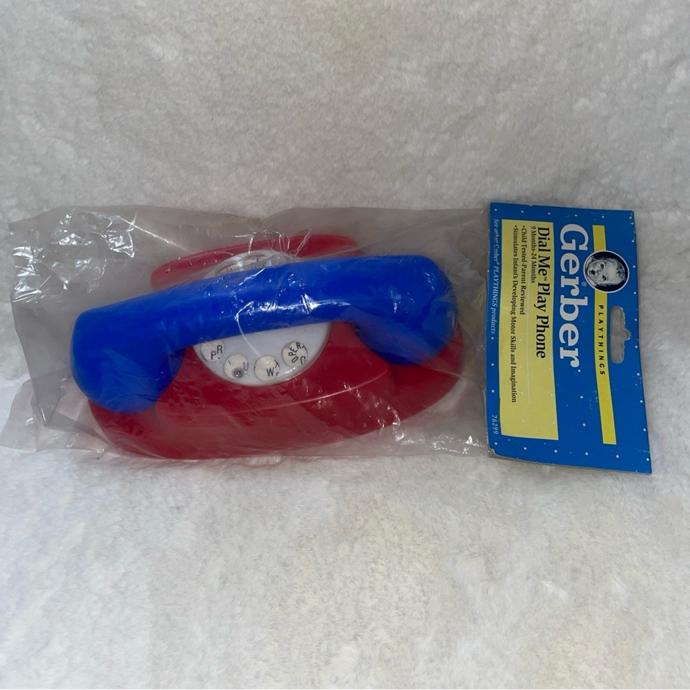 Vintage 1991 Gerber Dial Me Play Rotary Phone Baby Toy NOS NEW